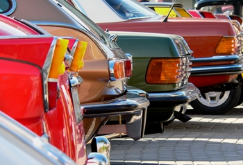 This photo depicting an auto restoration potpourri of older and classic cars was taken by photographer Janusz Gawron of Wadowice, Poland.